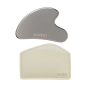 Gua Sha gravé en acier inoxydable et sa pochette en cuir